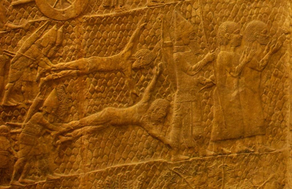 Detail of Judahite prisoner heads from the Lachish Relief showing woolly hair and broad facial features